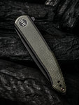 WE20043-4 WE Knives Smooth Sentinel | Ti with Green Micarta